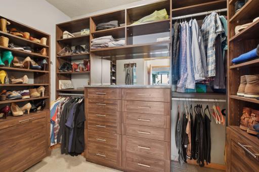What a closet! Custom built-ins and incredible storage.
