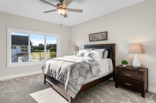 Also on the main floor you will find the luxurious owner's suite, a haven of comfort boasting
a private three-quarter bathroom