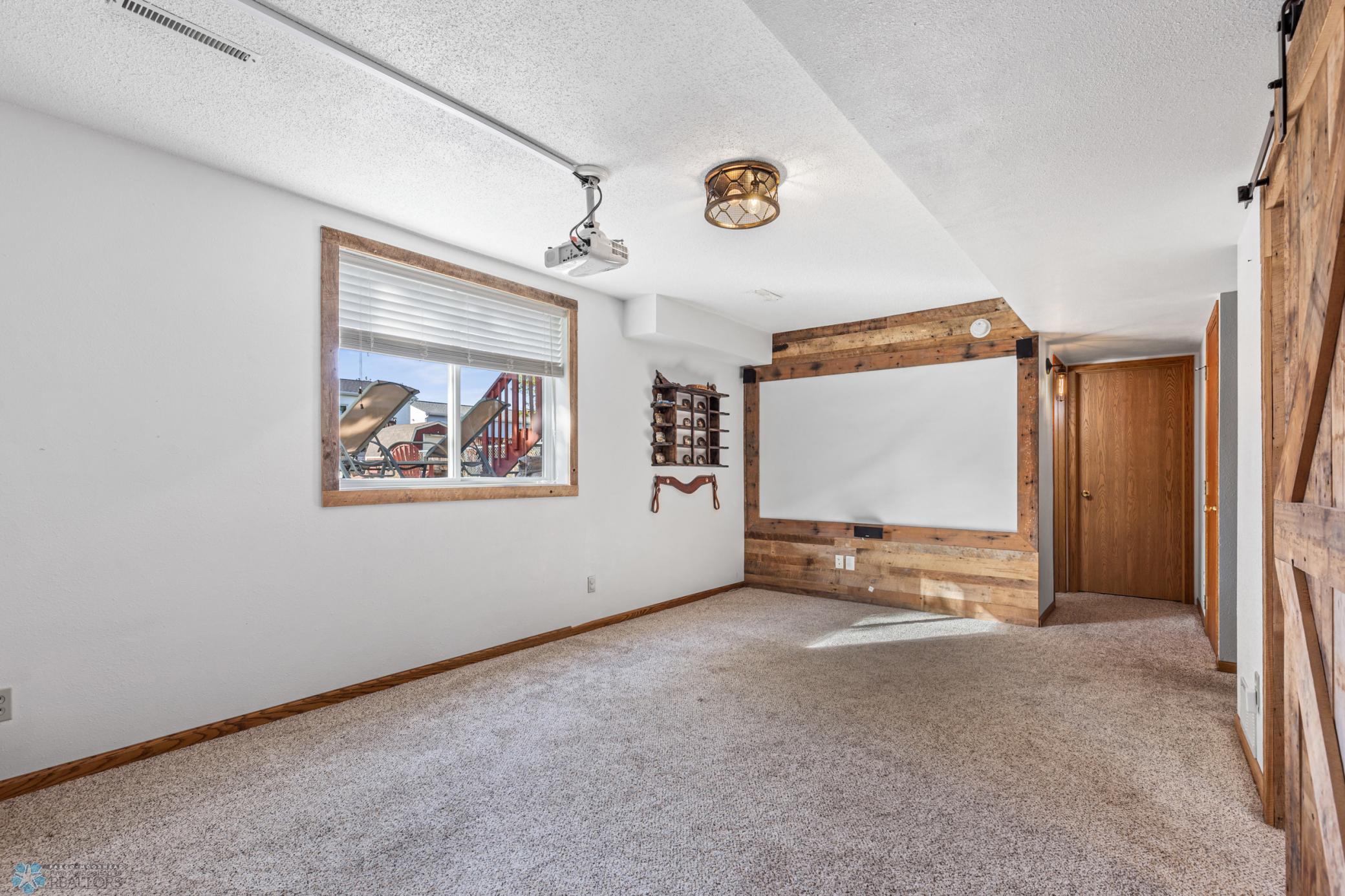 Family room downstairs with projector