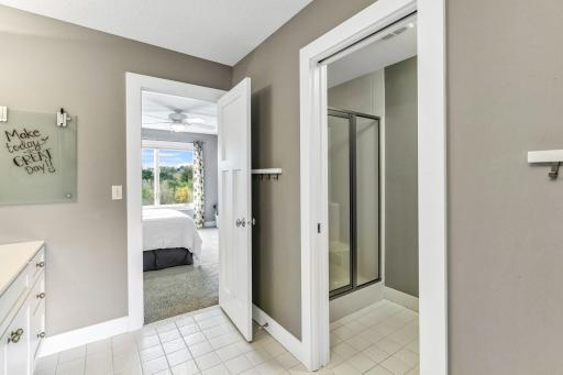 Pocket door access to the shower (glass shower doors) and toilet