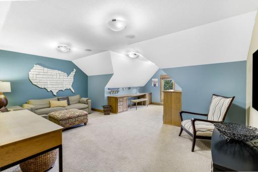 Bonus Room is a carefully tucked away space, great for hobbies, relaxing and play! Charming dormer ceilings