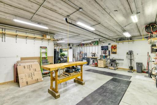 Great space for storing lawn equipment, boats, golf carts,.. etc. Mirrors the size of the main garage!
