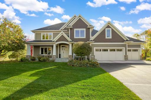 Meticulously cared for craftsman style home - balanced combination of shakes and lap Hardie siding with cultured stone accents