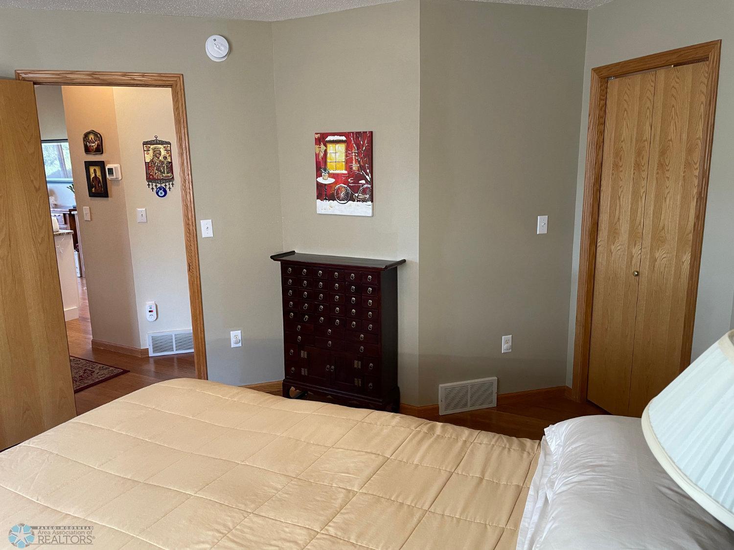 Master bedroom side view. Solid bamboo hardwood floor.