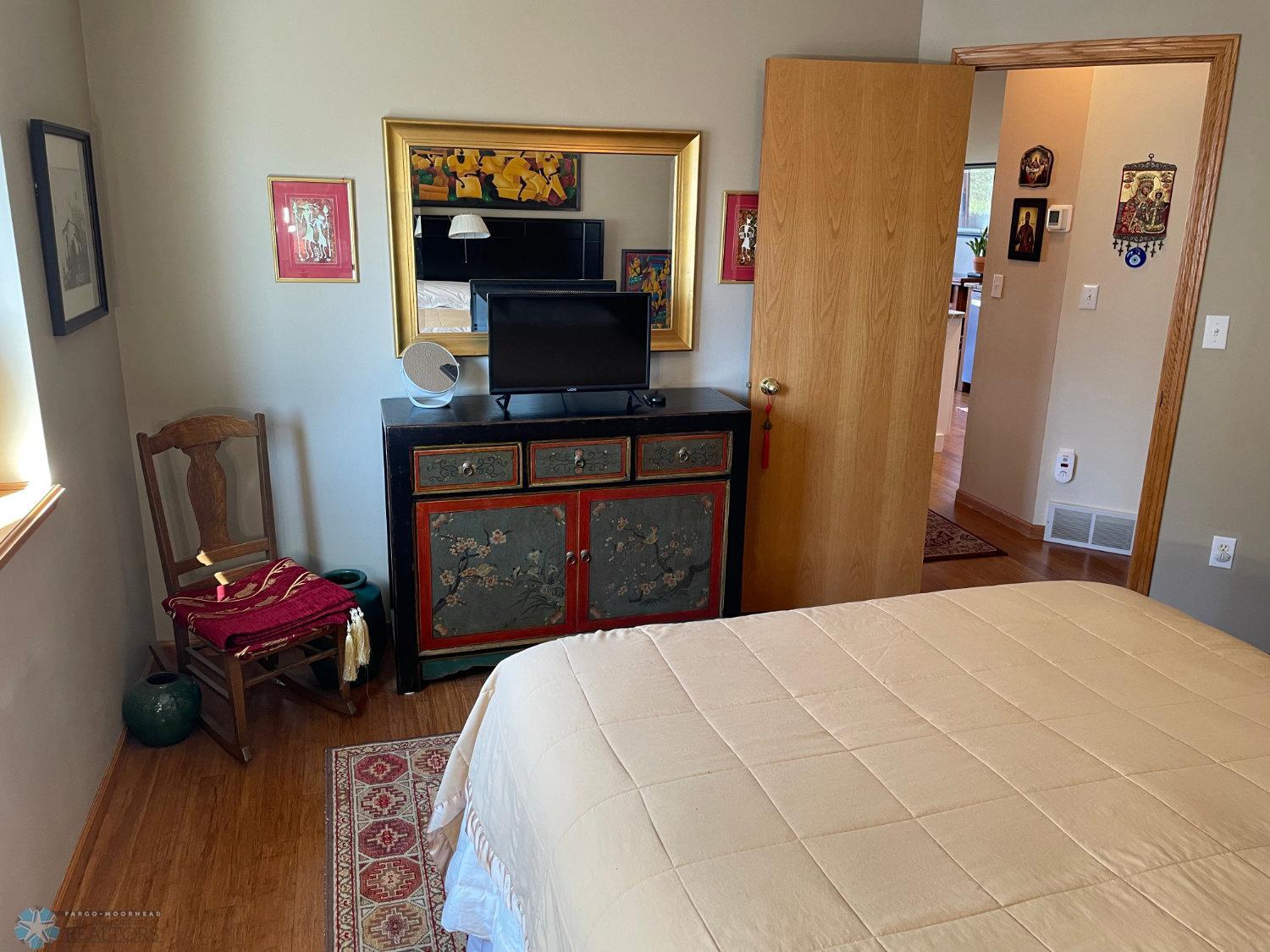 Master bedroom reverse view. Solid bamboo hardwood floor.
