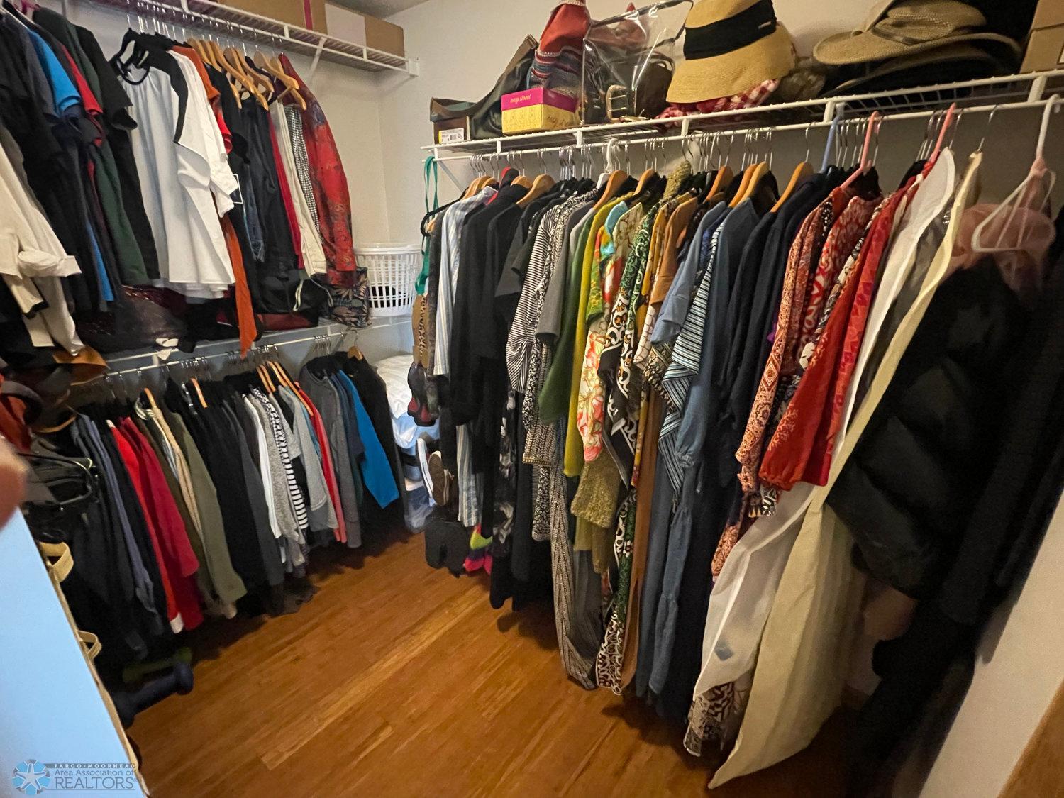 Master bedroom walk-in closet, Solid bamboo hardwood floor.