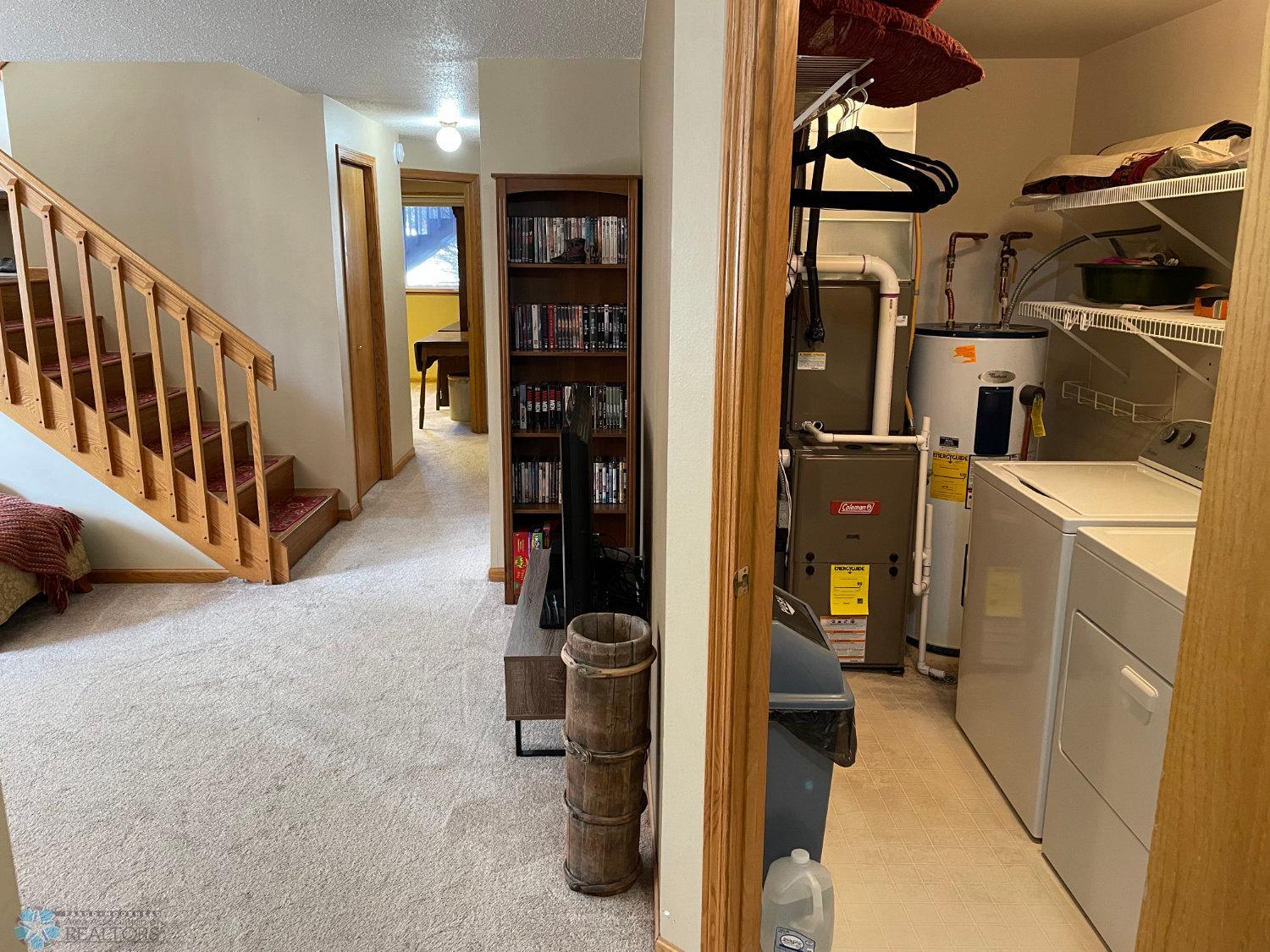 Family room and view to laundry:furnace room.