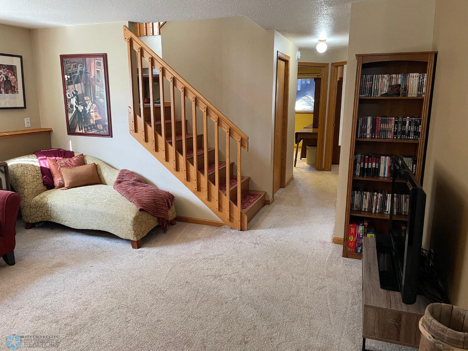 Family room view to stairway and hall.