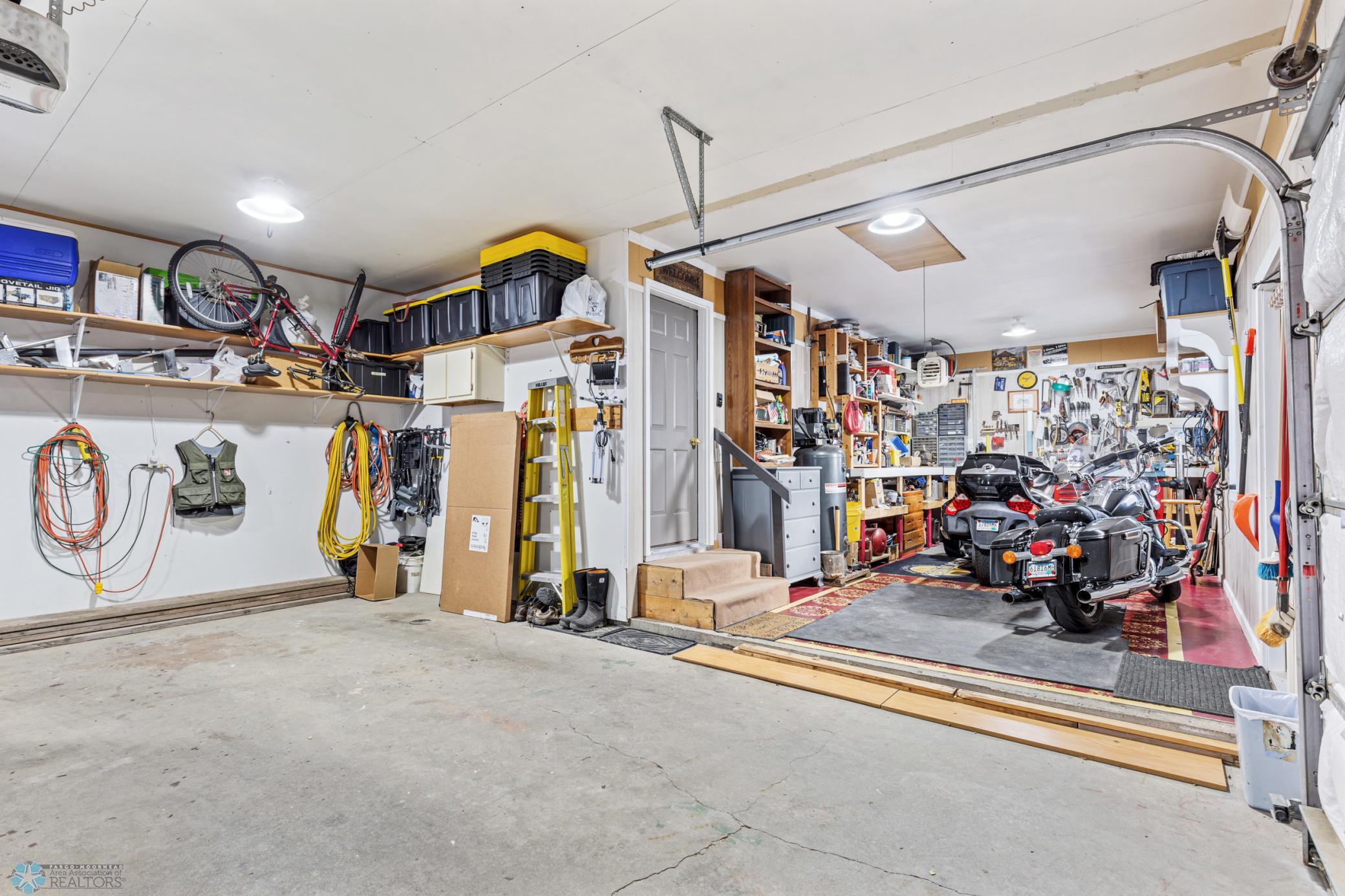 Heated/finished 3 stall garage, 3rd stall perfect for toys, hobbies or workshop pictured