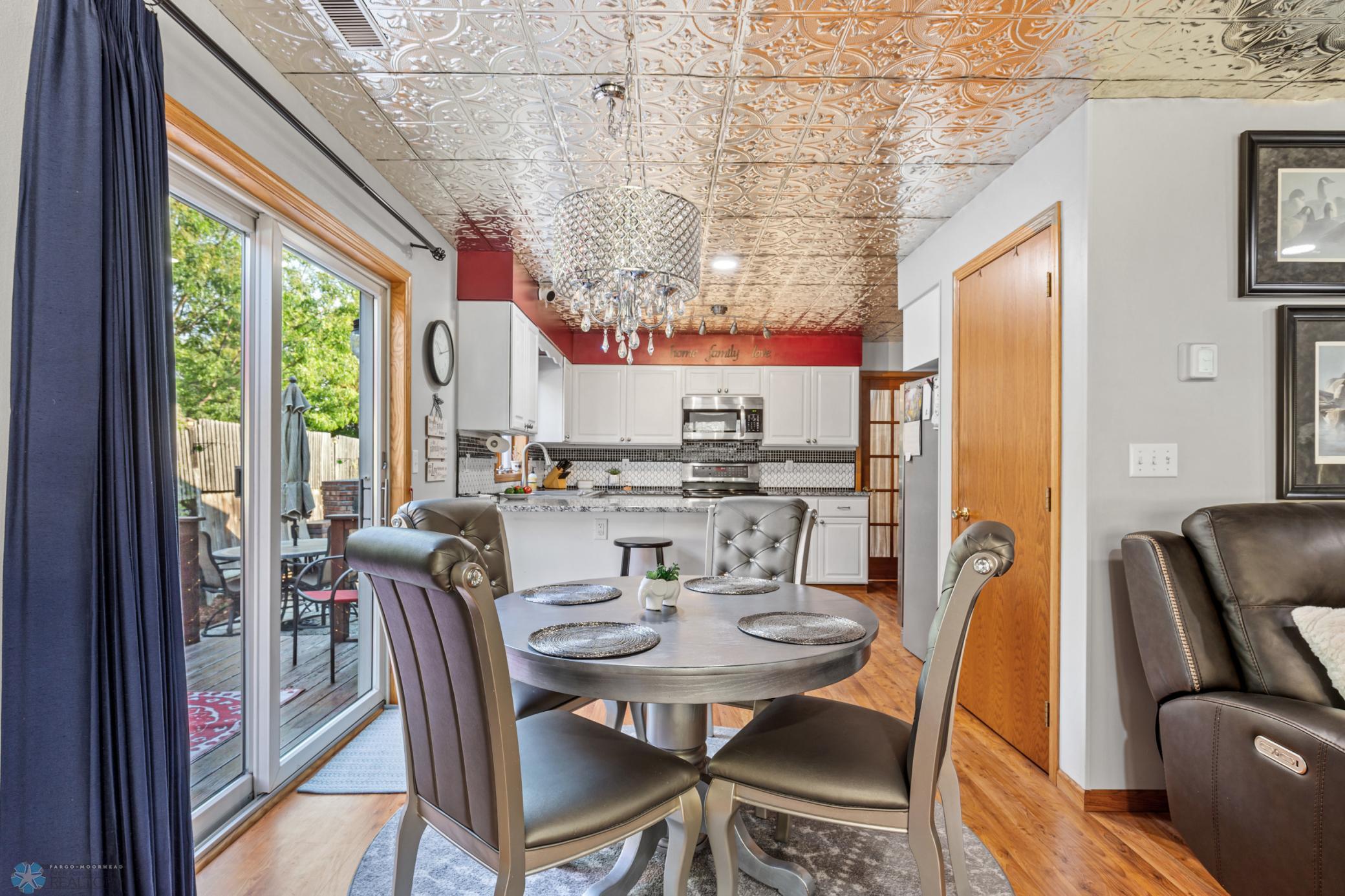 Informal dining, sliding doors to outside deck/patio