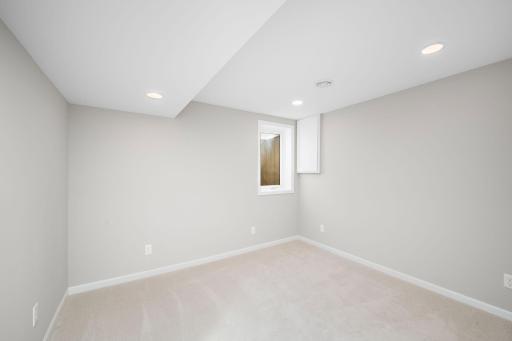 Third bedroom lower level offers flexibility for guests