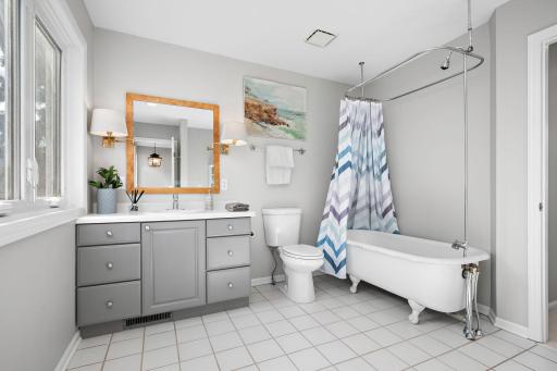 Spacious bathroom has room to add shower separate from soaking tub, make it your own