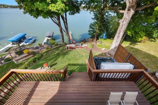 View from upper level deck shows the great views and mix of areas to enjoy from hot tub, sitting areas, firepit, etc.