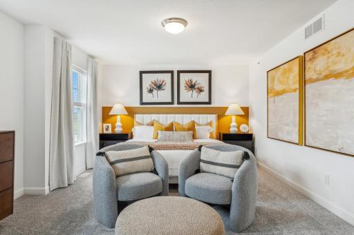 (Photo of a model home, actual homes finishes will vary) The lovely and spacious owner's bedroom features a 3/4 bath which walks through to a spacious walk-in closet. Plus an additional sitting or reading area.