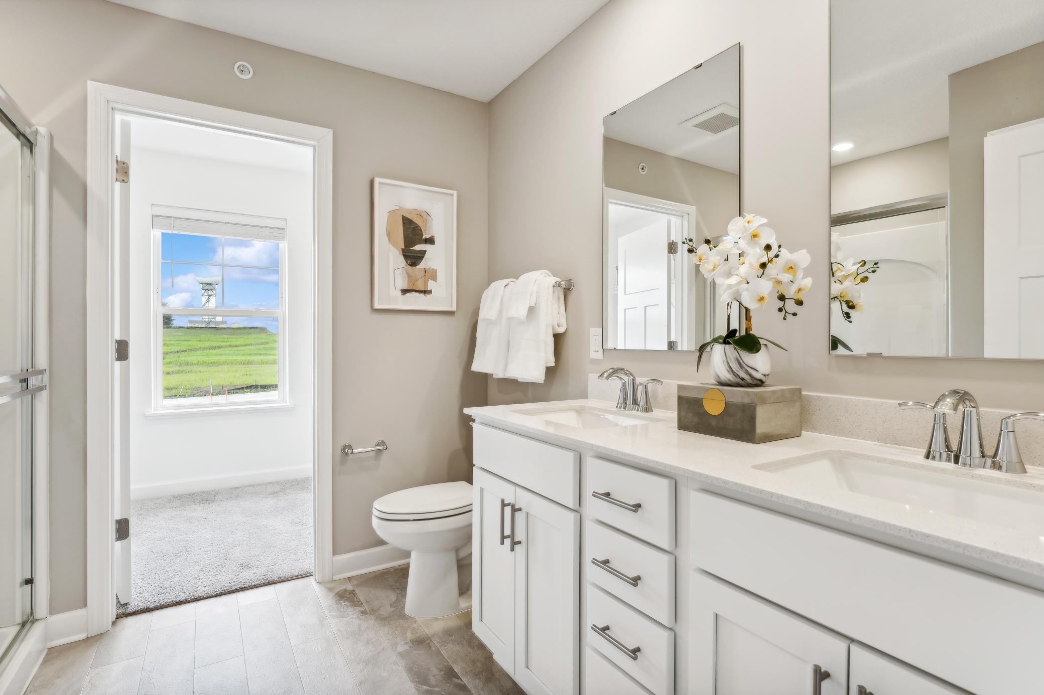 (Photo of a model home, actual homes finishes will vary) Another view of the primary bath!