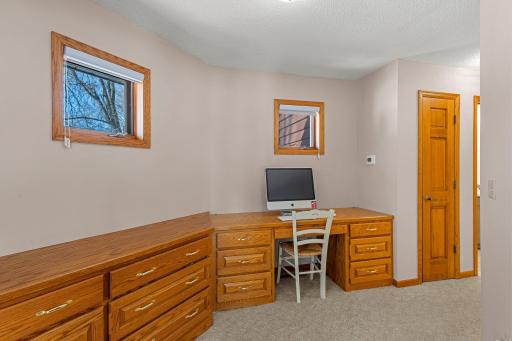 The thoughtful design integrates seamlessly into the room, maximizing both space and organization.