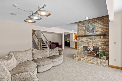 A large family room, complete with surround sound, has plenty of windows that allow you to take in the stunning views of the expansive acreage.
