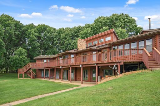The main-level deck is a show stopper, spanning the entire back of the home at an impressive 93x14 feet.