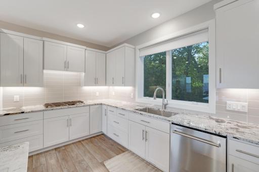 High End Fixtures and Stainless Steel Cooktop