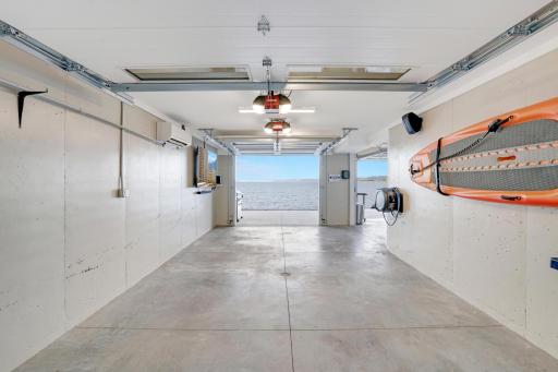 Parking area and glass garage doors for toys, play, or entertainning.