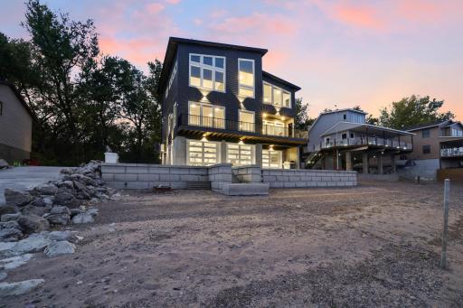 Beach Home is lit up and can be seen from the shorelines of Lake Pepin