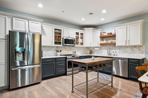 Photo for 4900 Underwood Lane N, H, Plymouth, MN 55442 - listing #6617941 Welcome home to spectacular, stylish modern design from top to bottom! Beautiful mix of natural woodwork, white, and a pop of color throughout. SS appliances, floating shelves and a few open glass doors make this one feel straight out of a magazine.