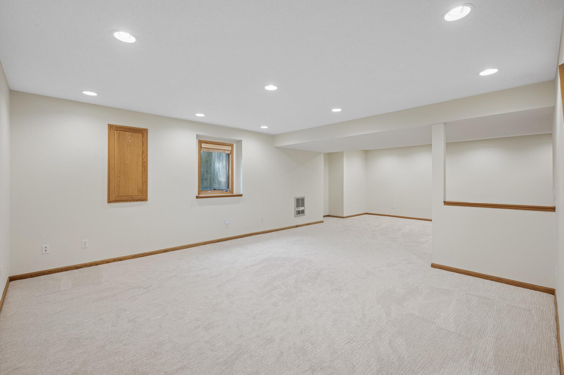 Lower level is freshly painted and new carpet