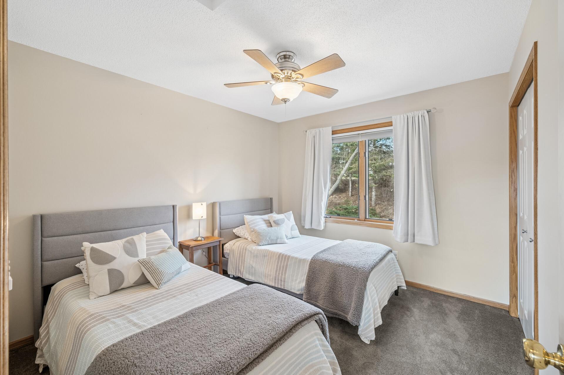 One of four bedrooms on the upper level