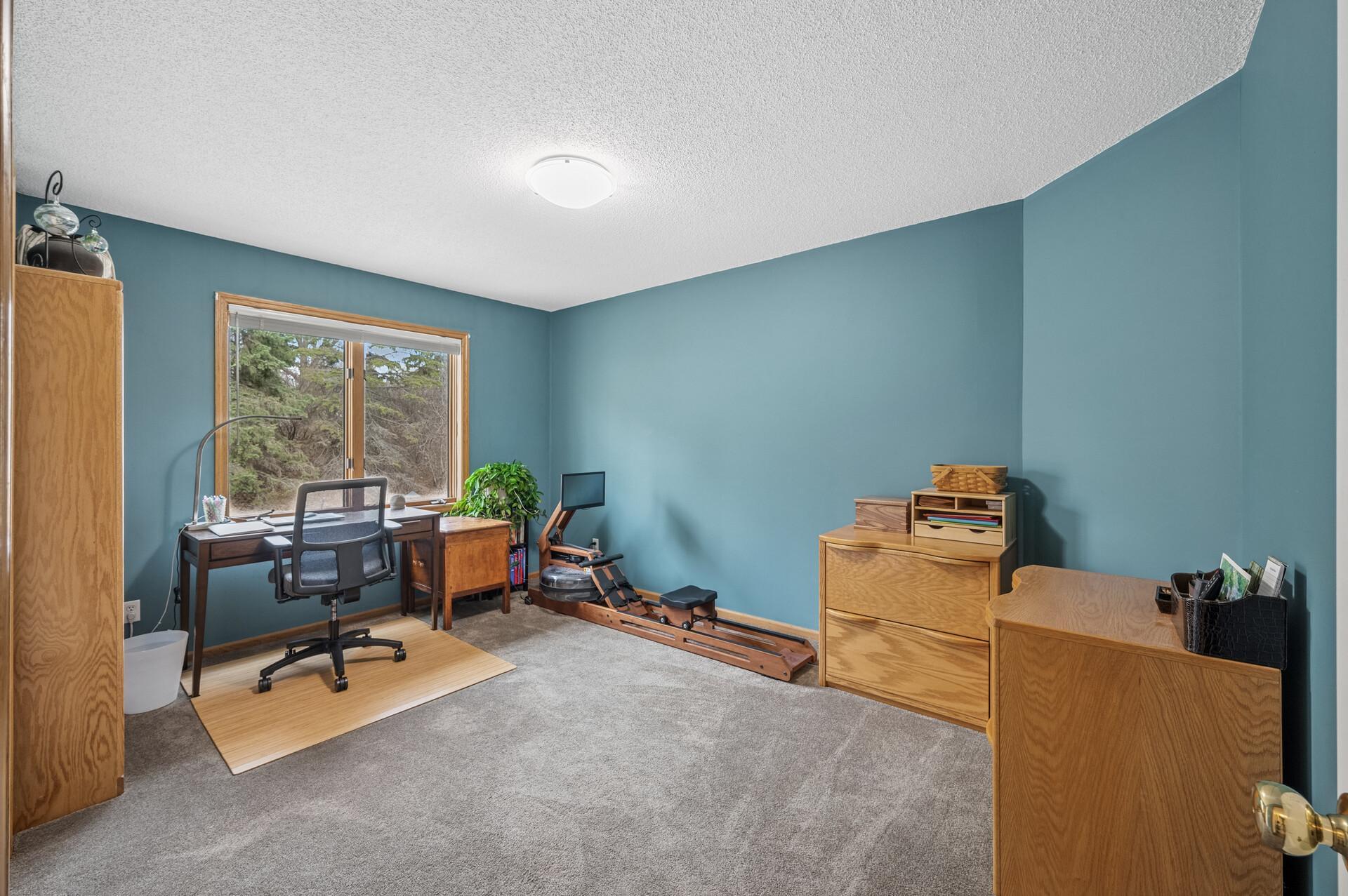 Third bedroom on upper level can also function as an ideal office space
