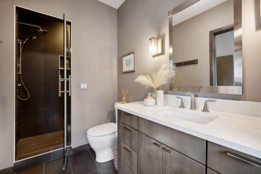 3/4 bath in the mudroom/laundry area of the home.