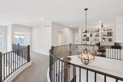 Catwalk to the upper bedrooms with a small office enclave.