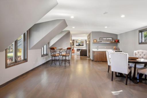 Upper-level amusement room with wet bar area and plenty of room for gaming and entertaining!