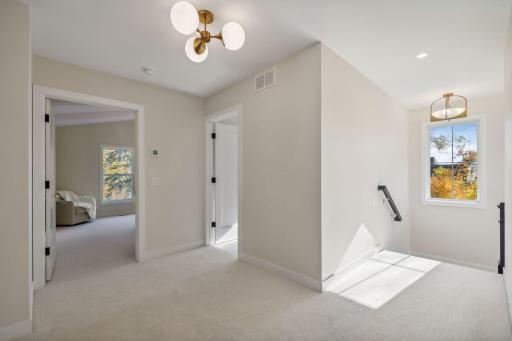 Ascend to the upper level and discover the inviting spaces above.