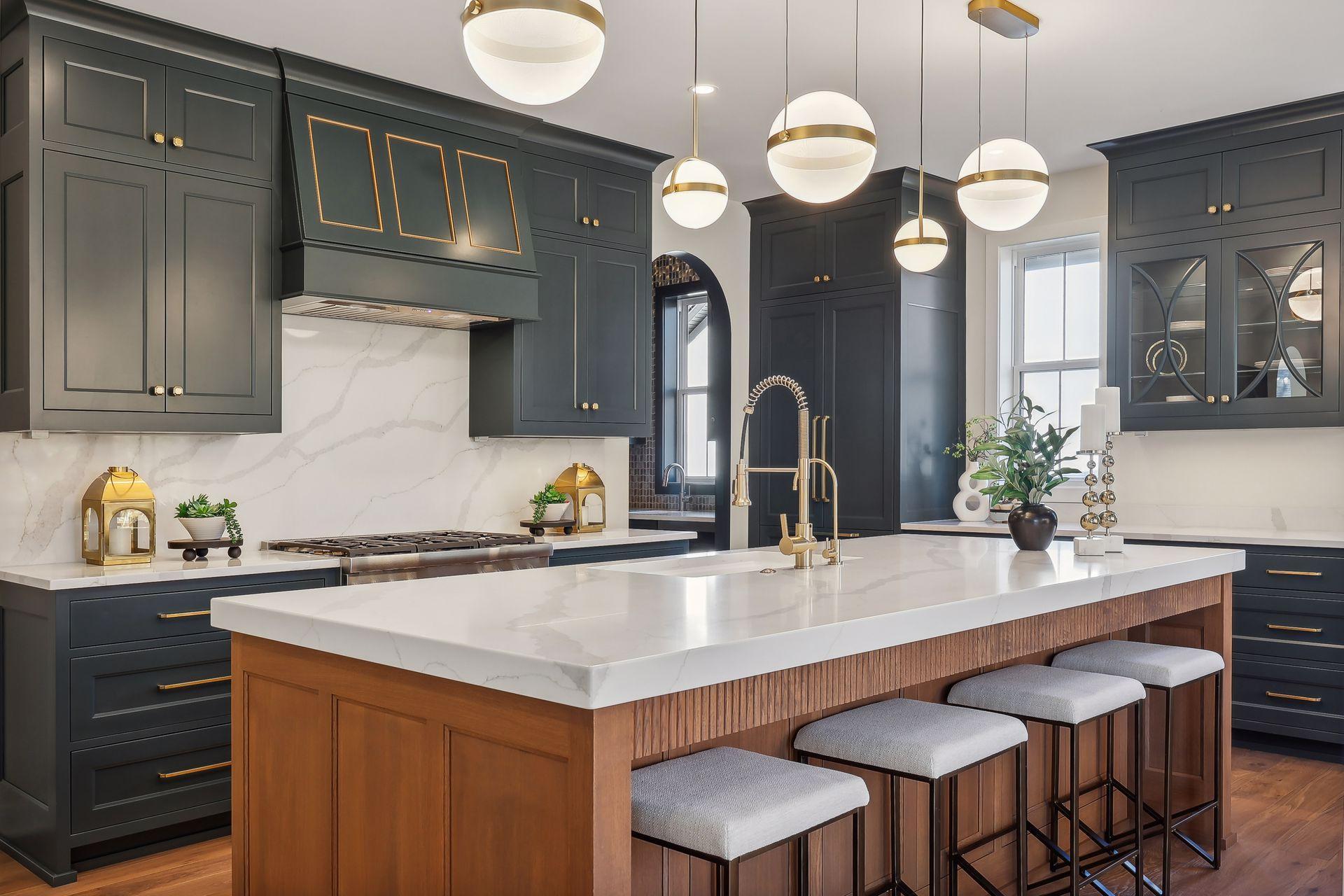 Discover elegance in this kitchen with a stylish range and exquisite gold applied molding