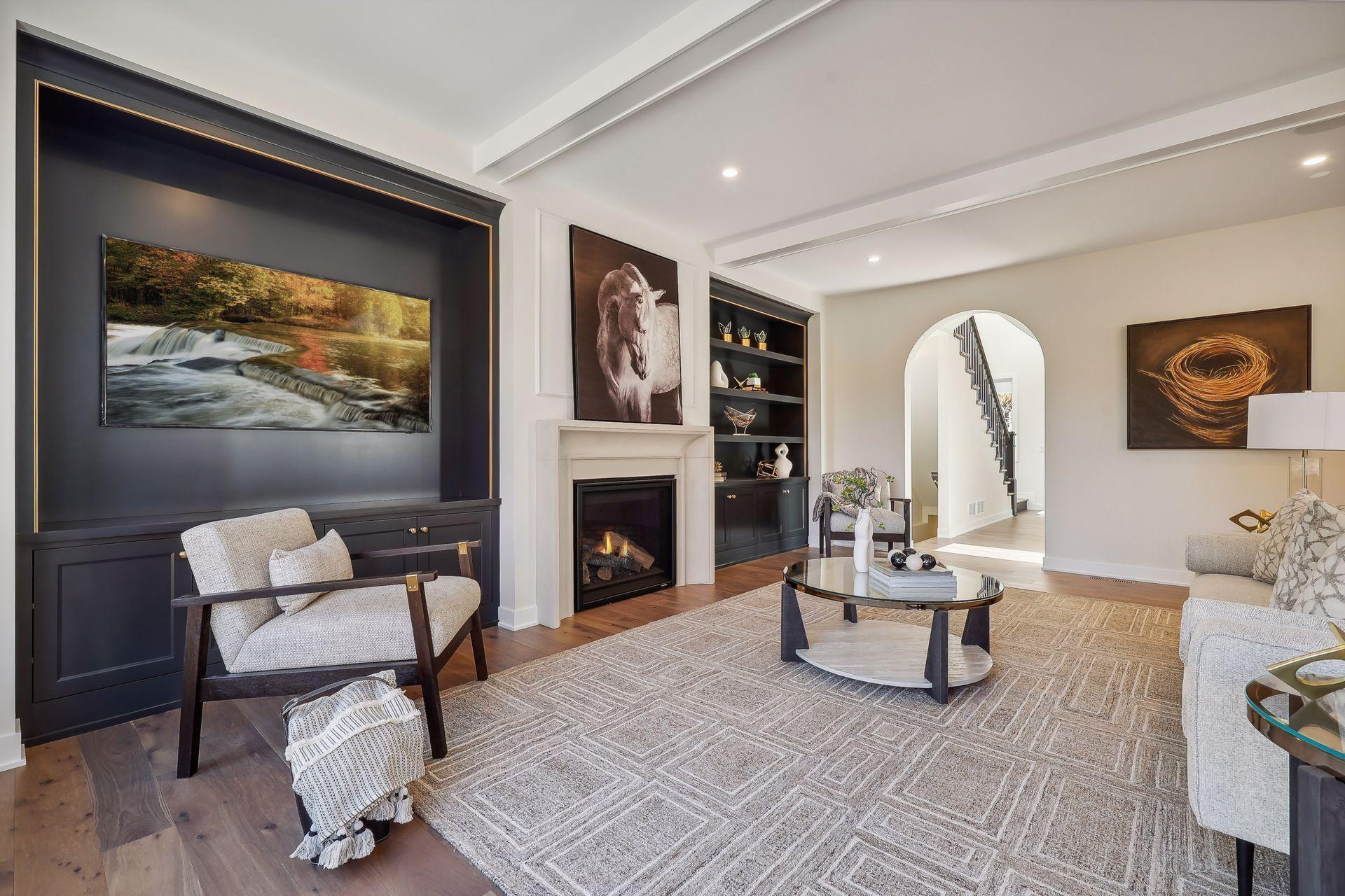 Cozy up by the gas fireplace in the great room, beautifully accented by three elegant beams overhead