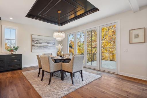 Enjoy seamless entertaining in this spacious dining room, bathed in natural light and easy access to the deck.
