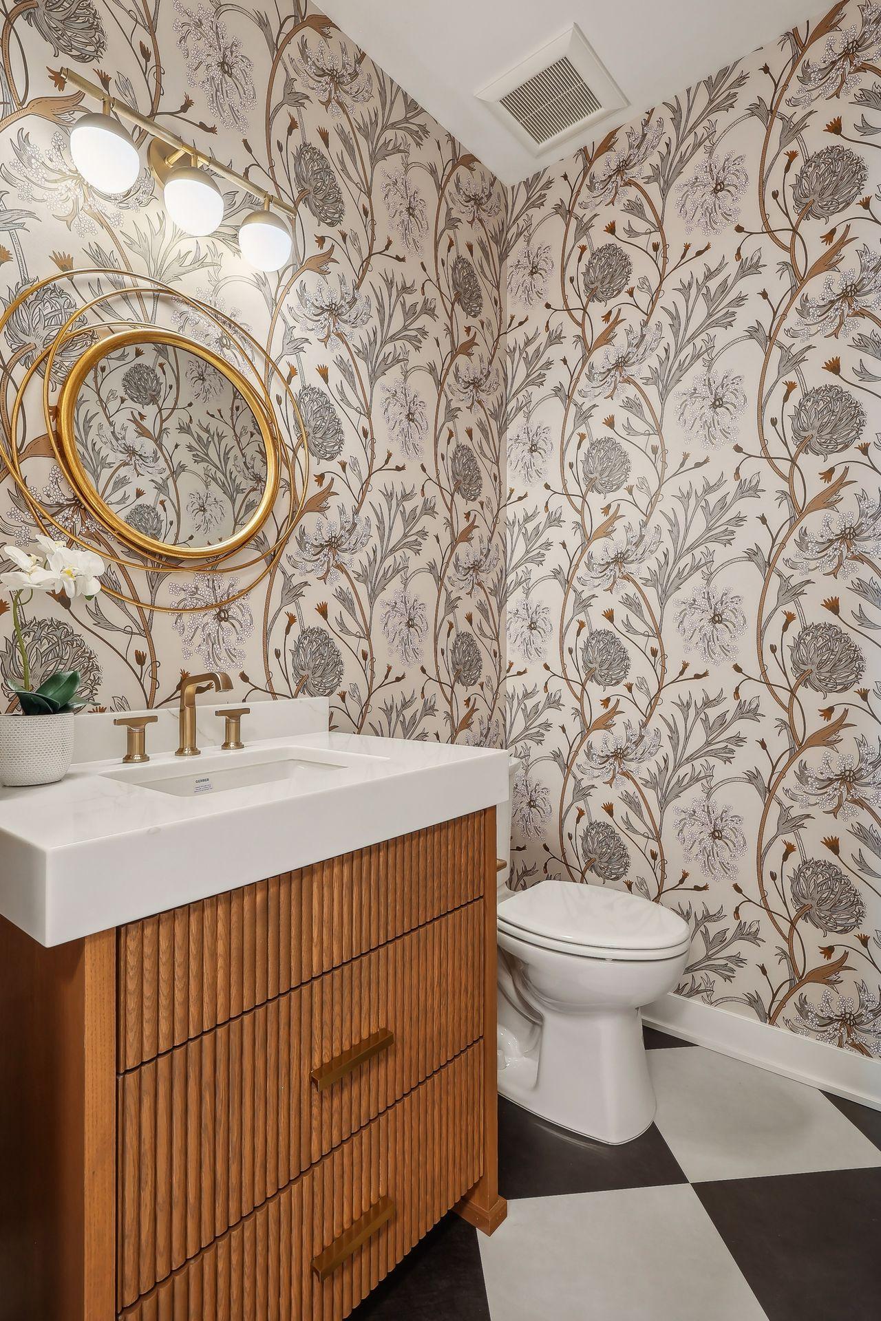 Main floor powder bathroom, featuring stylish Spoonflower wallpaper.