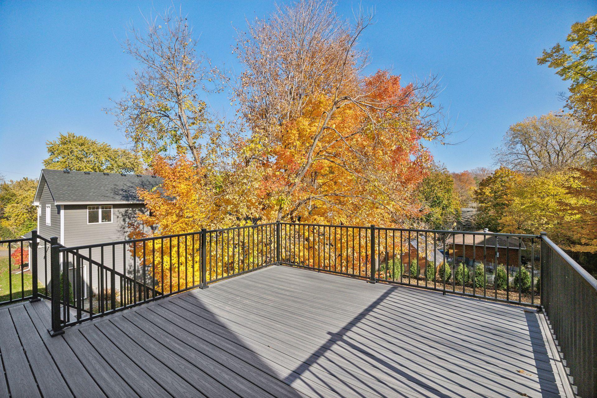 Relax and unwind on the spacious deck, perfect for outdoor enjoyment and gatherings.