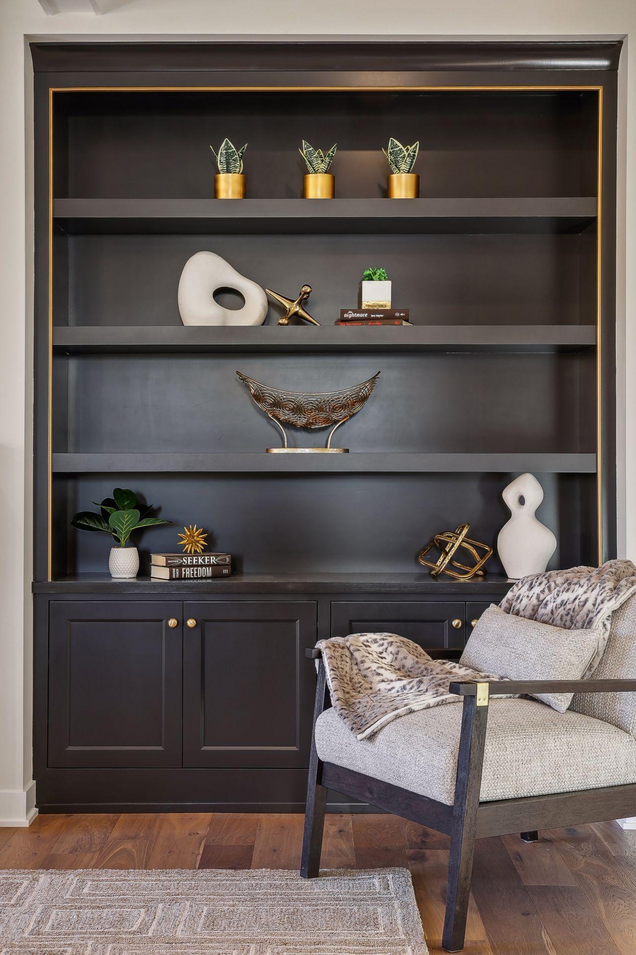 Lovely built-ins with a luxurious gold accent.
