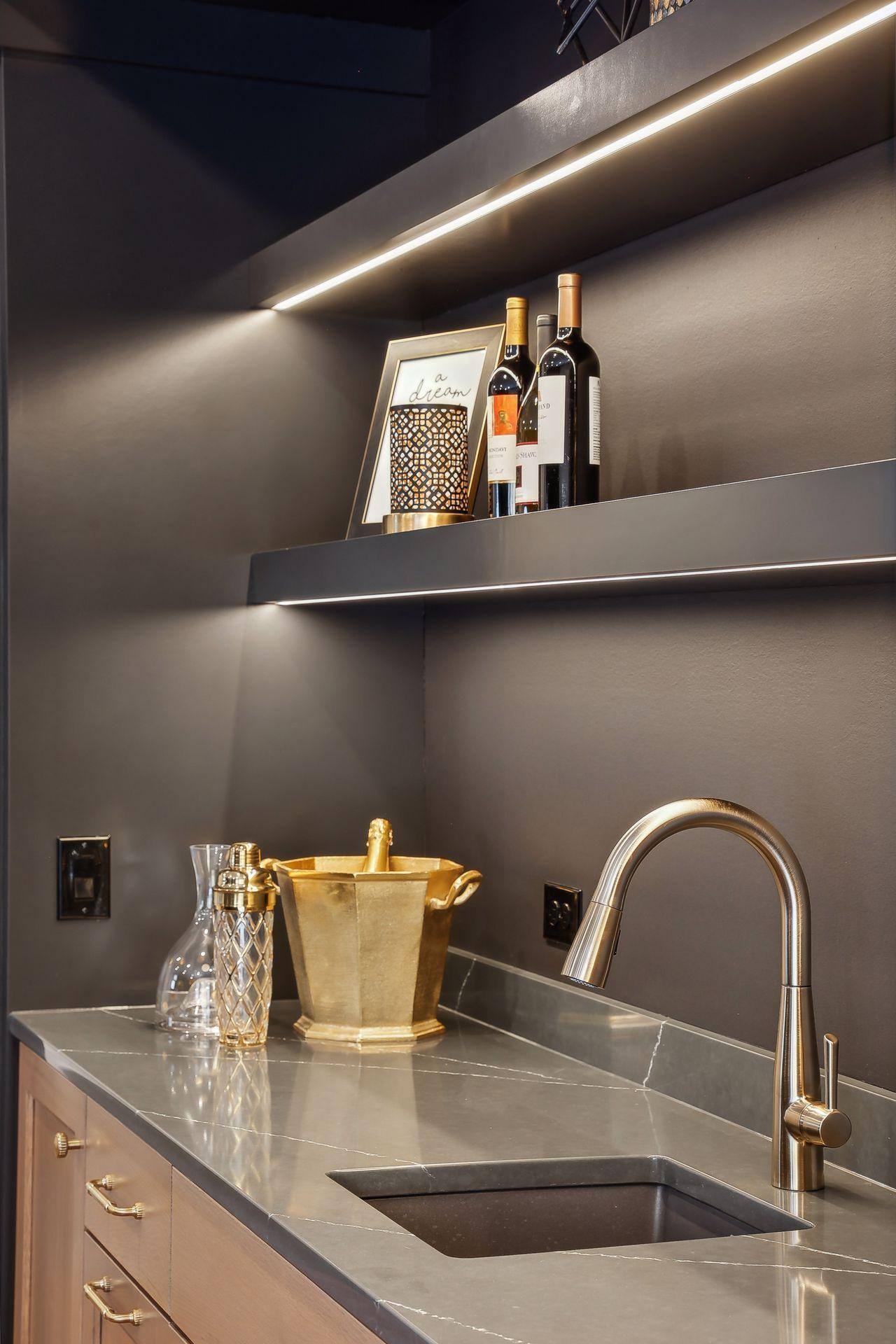 Under shelf lighting to illuminate the lower level bar.