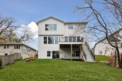 Explore the expansive yard, offering endless possibilities.