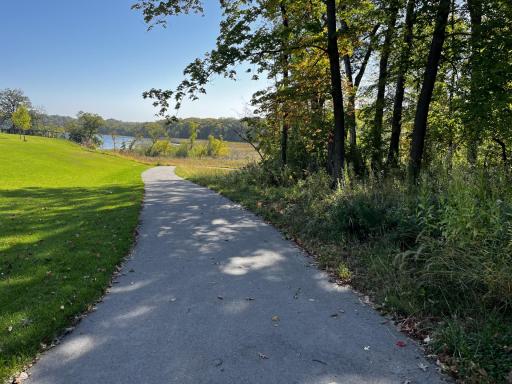Walking path down to Lake Lucy in just a few steps away from the home