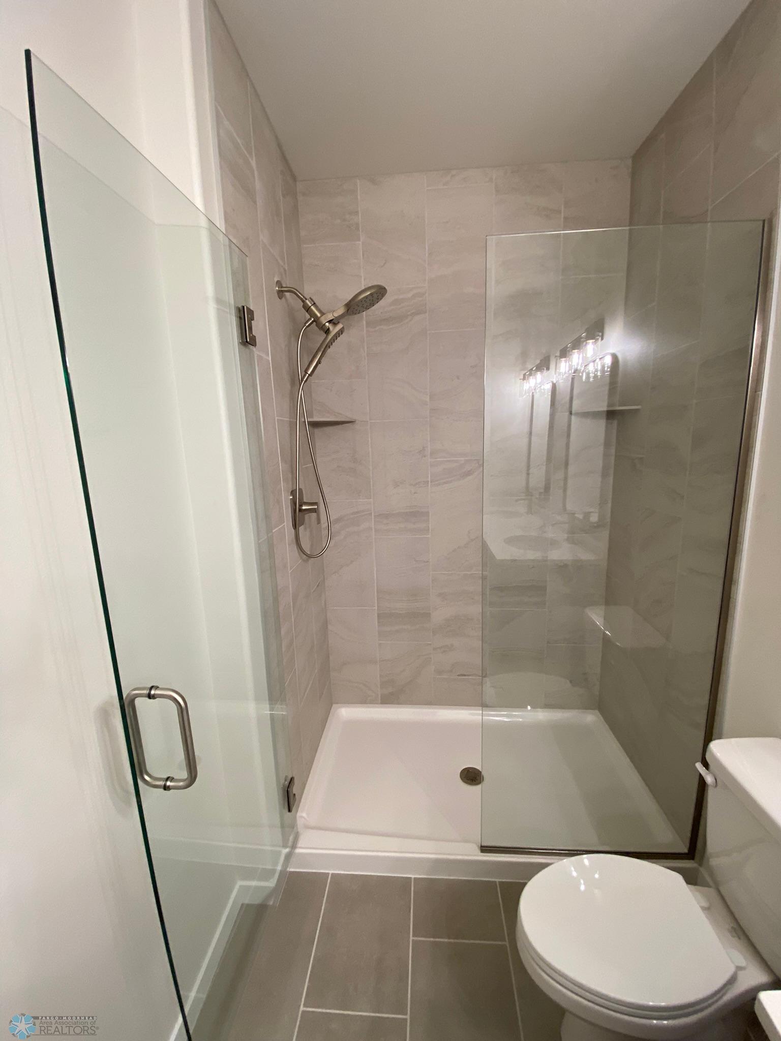 Tiled Shower w/Glass Surround