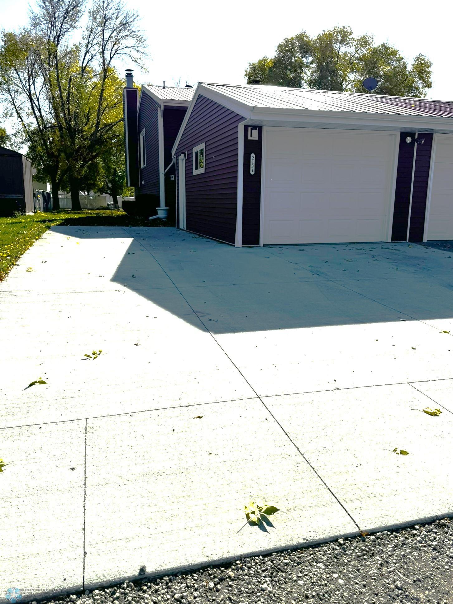 Garage and Parking on the side with all new concrete