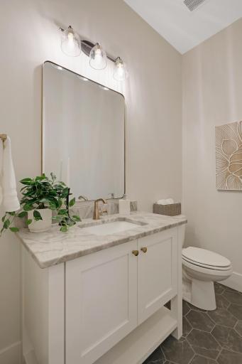 The main floor 1/2 bath has a perfect location.