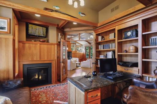 Office with Built-In Shelves and Gas Fireplace