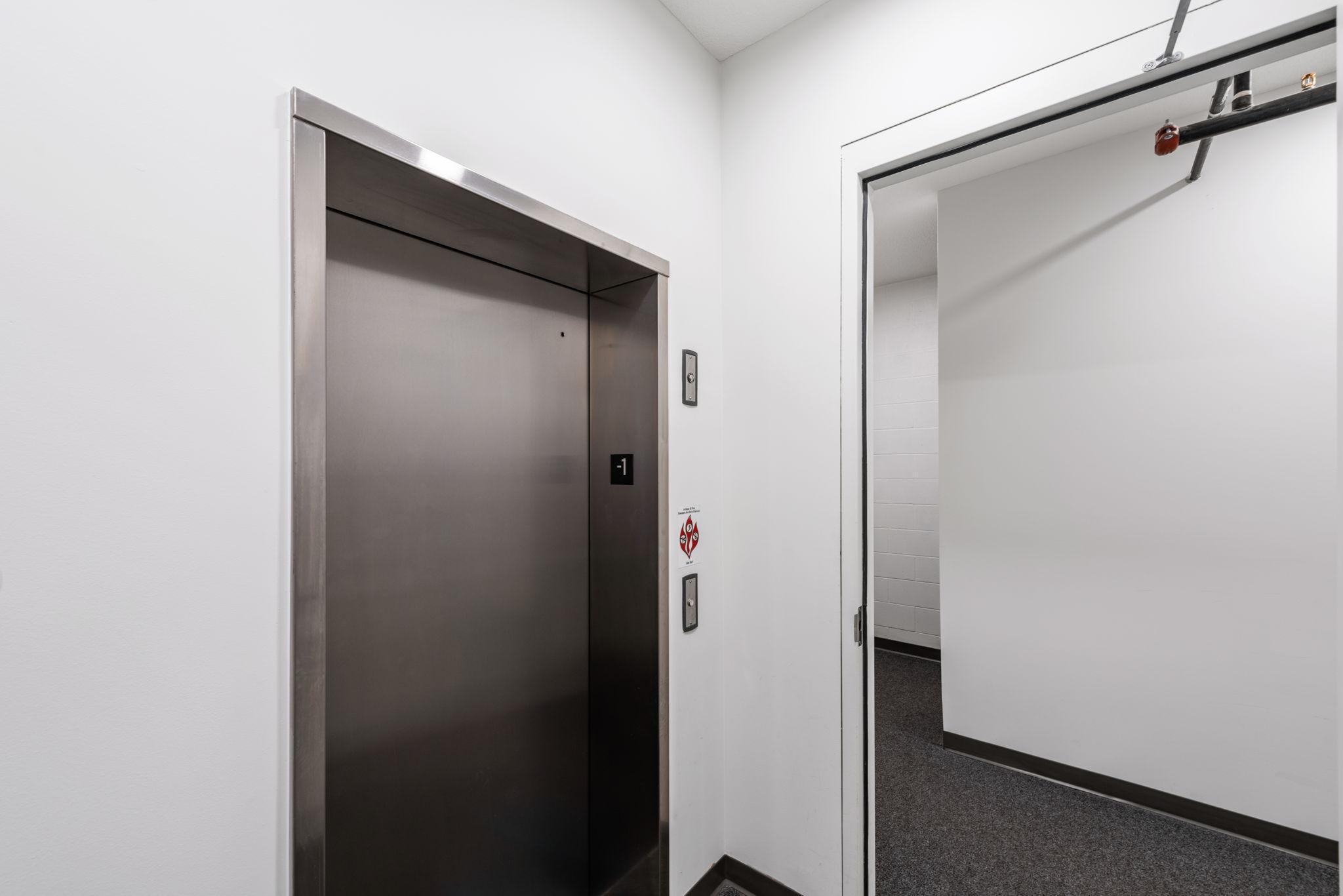 Convenient elevator as an option to one flight of stairs, leads you to your parking garage.