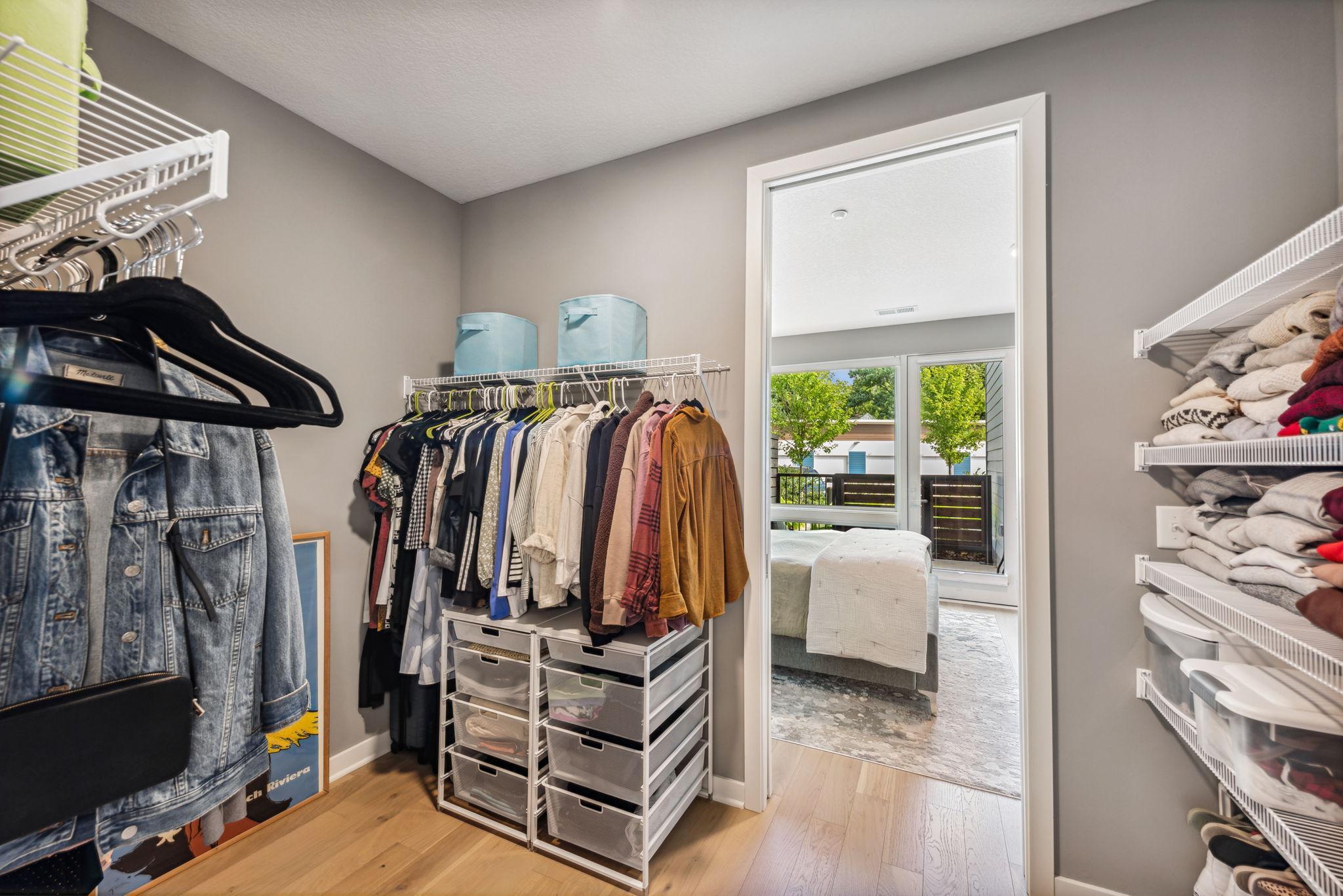 Spacious walk in primary suite closet