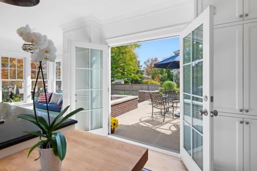 French doors from the kitchen to the rear terrace.