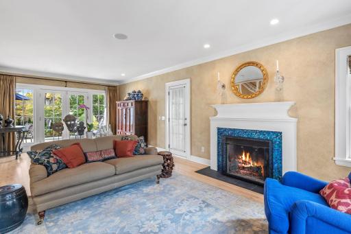 The living room has a wood-burning fireplace